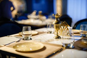 Restaurant interior decoration in golden and white shades
