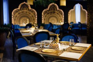 Architectural design in modern style for the restaurant in golden and blue shades